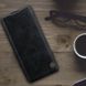 Кожаный чехол (книжка) Nillkin Qin Series для OnePlus 9 Pro Черный